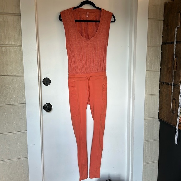 Free people MOVEMENT OFF TO THE RACES JUMPSUIT Orange xs - Picture 2 of 7